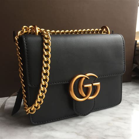 gucci black bag gold chain|gucci handbags with gold chain.